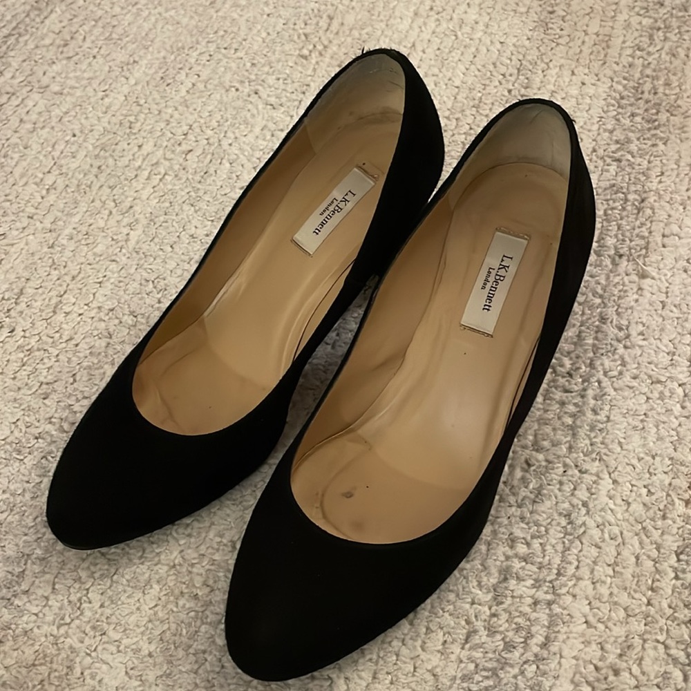 Black suede pumps